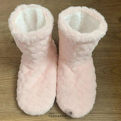 Pantoufles montantes rose pâle avec intérieur blanc duveteux